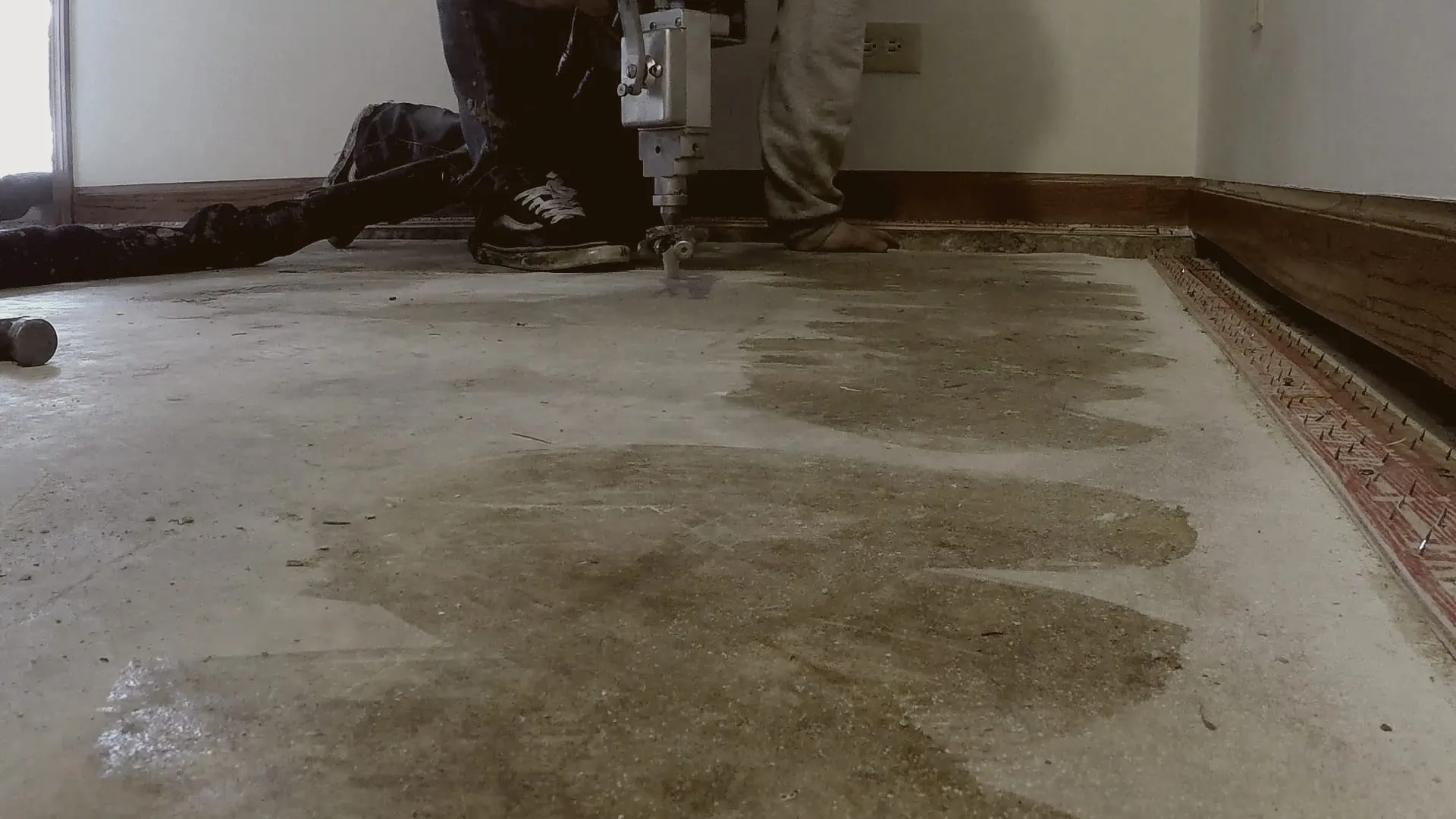 Injecting an interior floor slab where the flooring has been lifted
